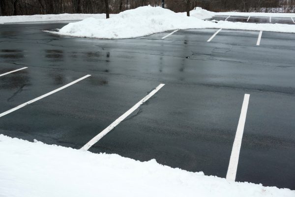 empty parking lot with snow removed
